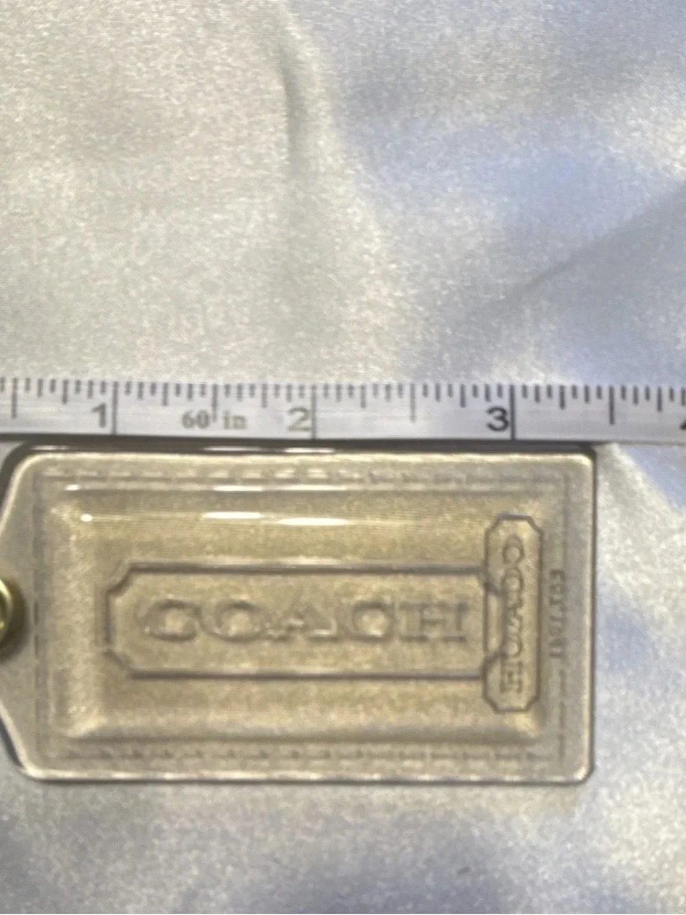 Coach Clear Hangtag (Poppy).  3.5 in